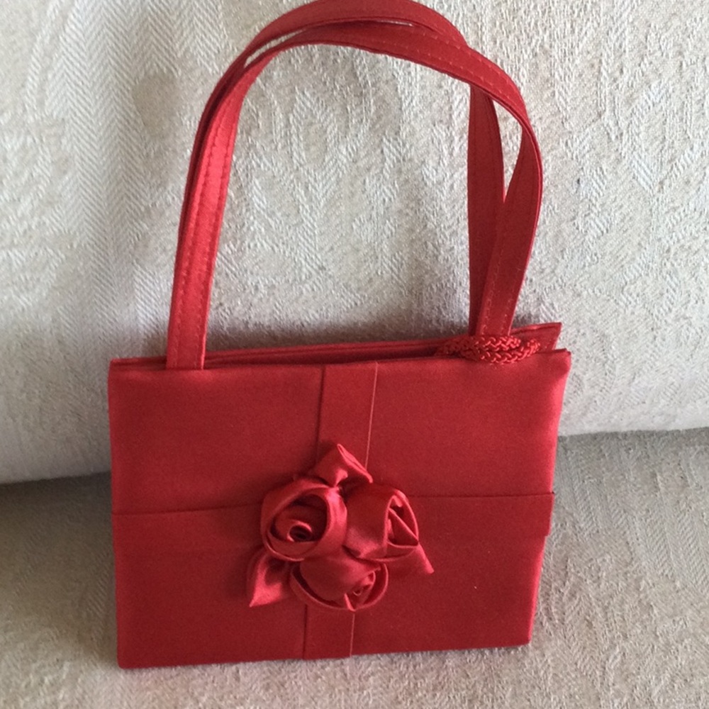 Red satin purse. New .5.5” x 6.5 wide